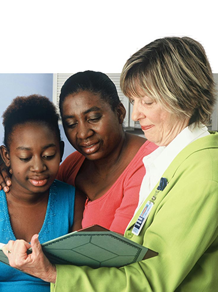 Teen health visit, teen girl her mom, and pediatrician at Quality Care Pediatrics, Stonecrest, GA.